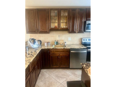 Don't miss This beautifully updated 2/2 penthouse condo