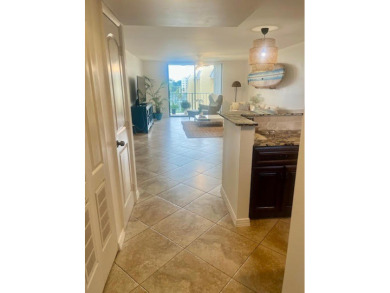 Don't miss This beautifully updated 2/2 penthouse condo