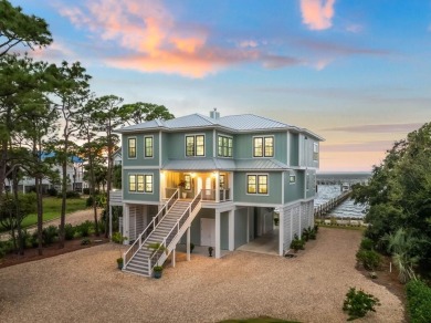 Premier, one of a kind bayfront home with prime boating access