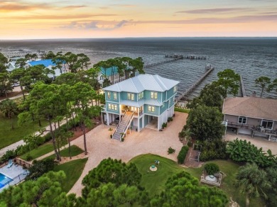 Premier, one of a kind bayfront home with prime boating access