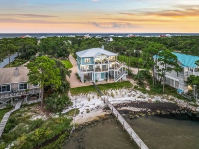 Premier, one of a kind bayfront home with prime boating access