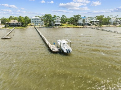 Premier, one of a kind bayfront home with prime boating access