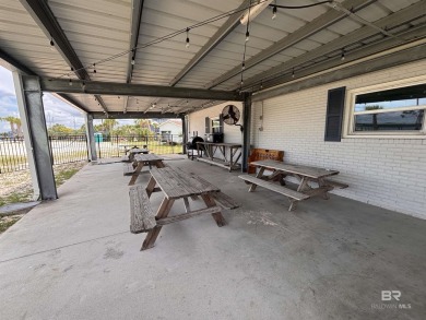 Adorable Raised Beach House in Bear Point!  Step through the