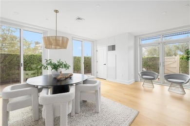 Set within the gates of the Aquidneck Club, this exquisitely and