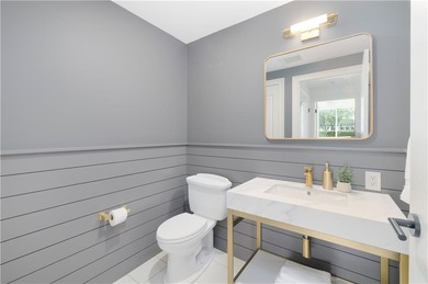 Set within the gates of the Aquidneck Club, this exquisitely and