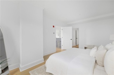 Set within the gates of the Aquidneck Club, this exquisitely and