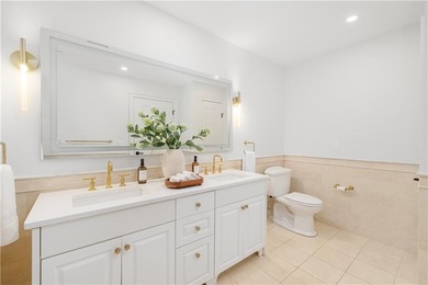 Set within the gates of the Aquidneck Club, this exquisitely and