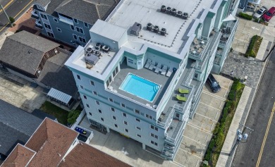 BEACH BLOCK UPSCALE CONDO WITH OCEAN VIEWS & ROOF TOP POOL! The