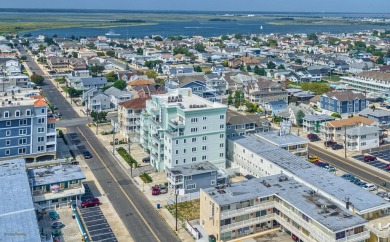 BEACH BLOCK UPSCALE CONDO WITH OCEAN VIEWS & ROOF TOP POOL! The