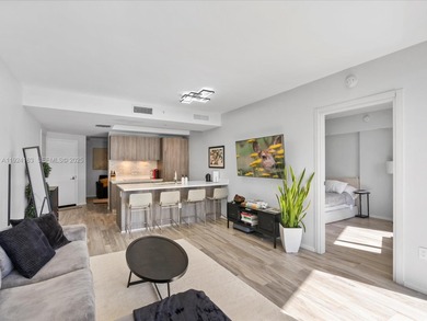 High above Brickell, this stunning SLS LUX residence offers a