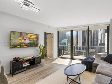 High above Brickell, this stunning SLS LUX residence offers a