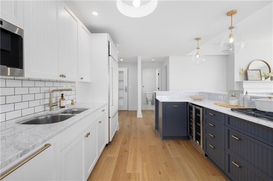 Experience refined coastal elegance in this fully renovated