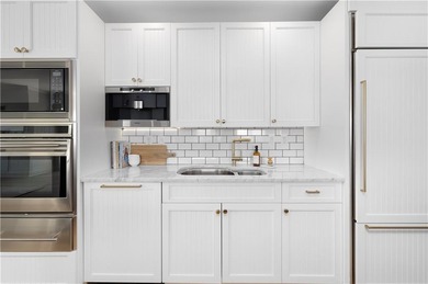 Experience refined coastal elegance in this fully renovated