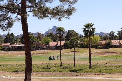Enjoy expansive views of Stone Creek golf course and Phoenix's