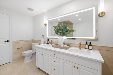 Experience refined coastal elegance in this fully renovated