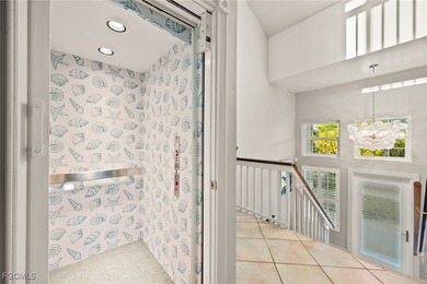 Situated in the serene heart of Bokeelia, this exquisite