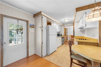 Charming mobile home on a cul-de-sac with a fenced yard and