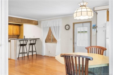 Charming mobile home on a cul-de-sac with a fenced yard and