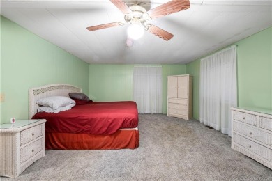 Charming mobile home on a cul-de-sac with a fenced yard and