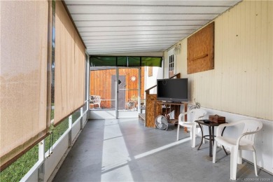 Charming mobile home on a cul-de-sac with a fenced yard and