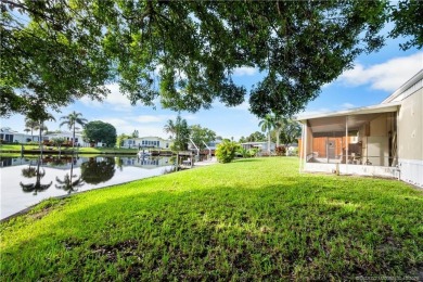 Charming mobile home on a cul-de-sac with a fenced yard and