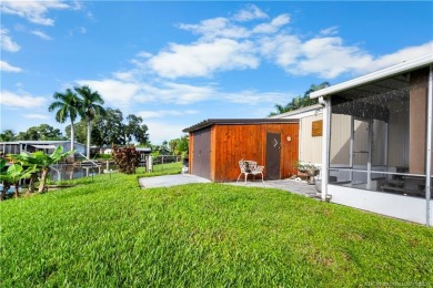Charming mobile home on a cul-de-sac with a fenced yard and