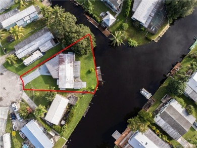 Charming mobile home on a cul-de-sac with a fenced yard and