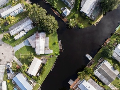 Charming mobile home on a cul-de-sac with a fenced yard and