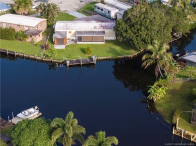 Charming mobile home on a cul-de-sac with a fenced yard and