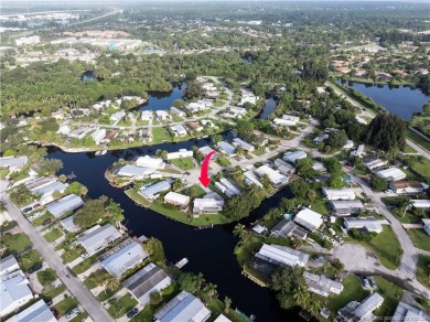 Charming mobile home on a cul-de-sac with a fenced yard and