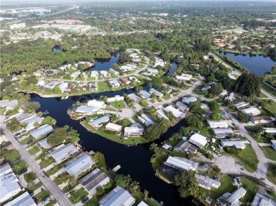 Charming mobile home on a cul-de-sac with a fenced yard and
