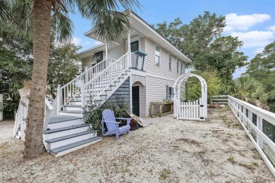 Welcome to 106 Edward Ave in Murrells Inlet -- a rare waterfront