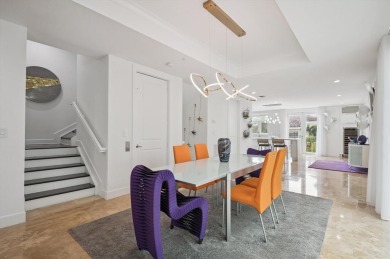 Experience luxury waterfront living in this impeccably