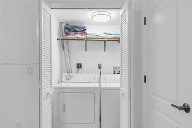 Live on a private, guarded island in Sunny Isles at Poinciana