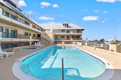 Discover the ultimate coastal living in Unit 1N at The Club at