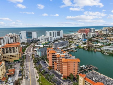 Tropical coastal living at its finest in Clearwater Beach. Step