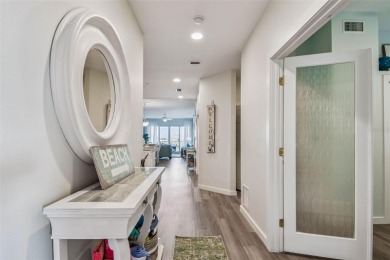 Tropical coastal living at its finest in Clearwater Beach. Step