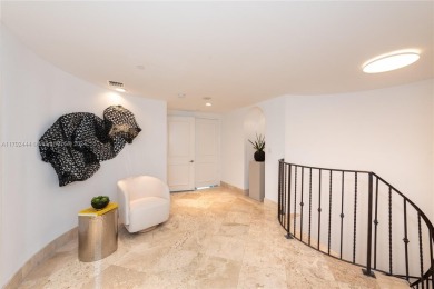 A rare find! This 4,200 SF two-level residence at the Ocean Club