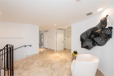 A rare find! This 4,200 SF two-level residence at the Ocean Club