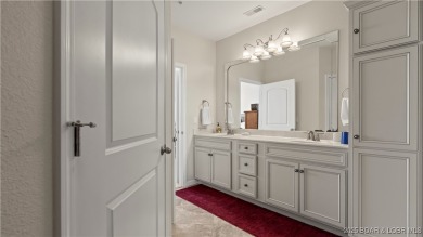 Experience the ultimate lakefront lifestyle at this stunning