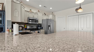 Experience the ultimate lakefront lifestyle at this stunning