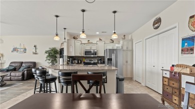 Experience the ultimate lakefront lifestyle at this stunning