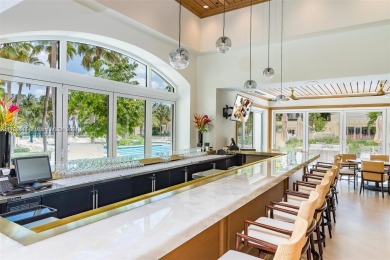 A rare find! This 4,200 SF two-level residence at the Ocean Club