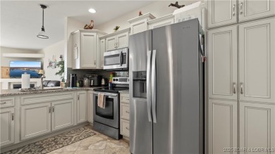 Experience the ultimate lakefront lifestyle at this stunning