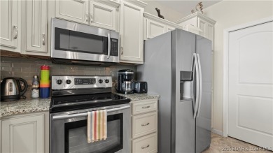 Experience the ultimate lakefront lifestyle at this stunning