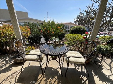 Welcome to this beautiful and peaceful 55+ gated senior mobile