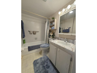 Serene 55+ community of Regal Palms! This third-floor unit