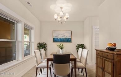 Welcome to Villas at Waterside Unit 100B, a meticulously