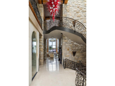 With an expansive lake front view, this home was designed for