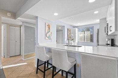 Welcome to coastal living at its finest in this beautifully